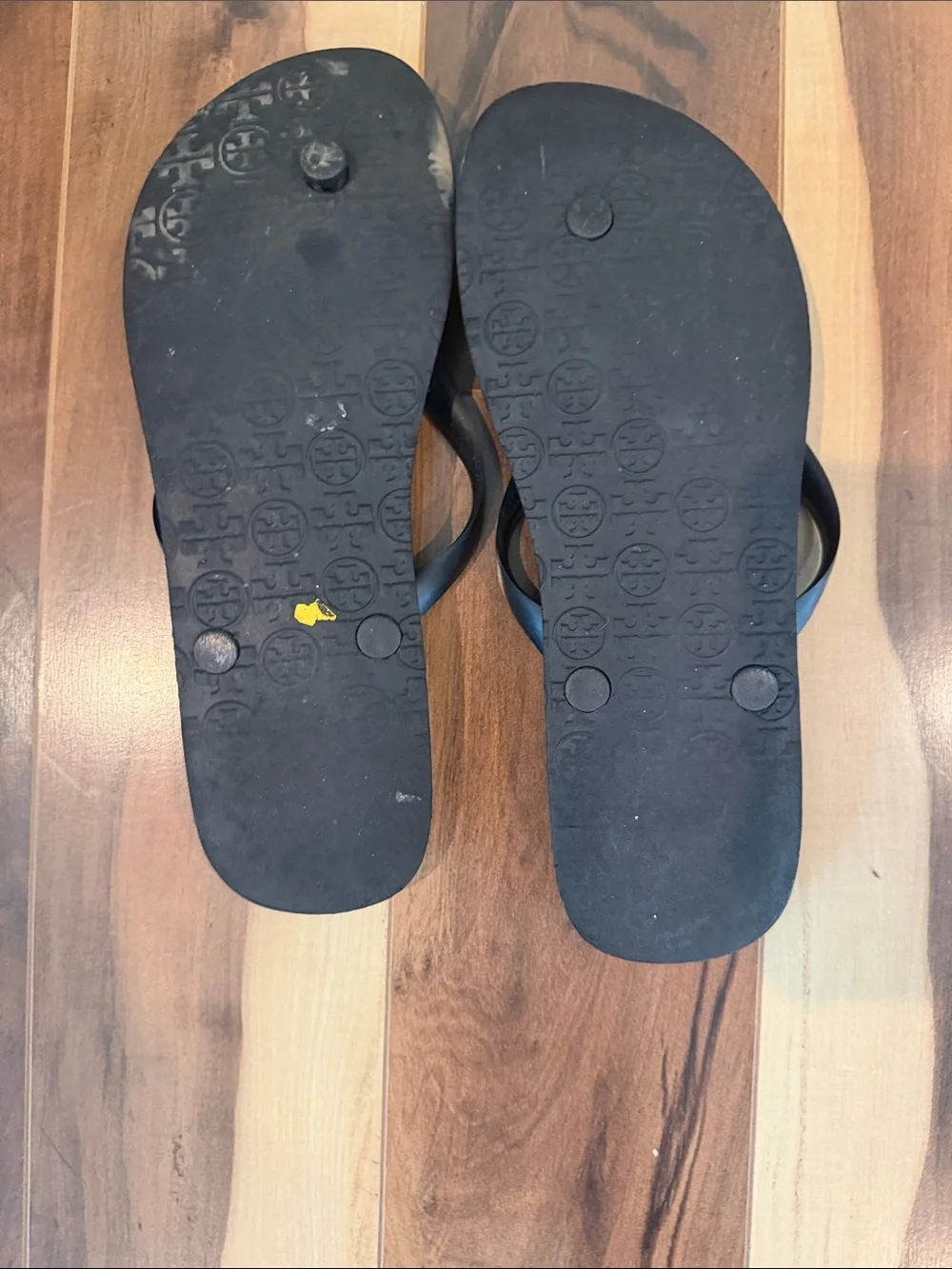 Tory Burch women’s  Black & White Logo Pattern Flip Flops